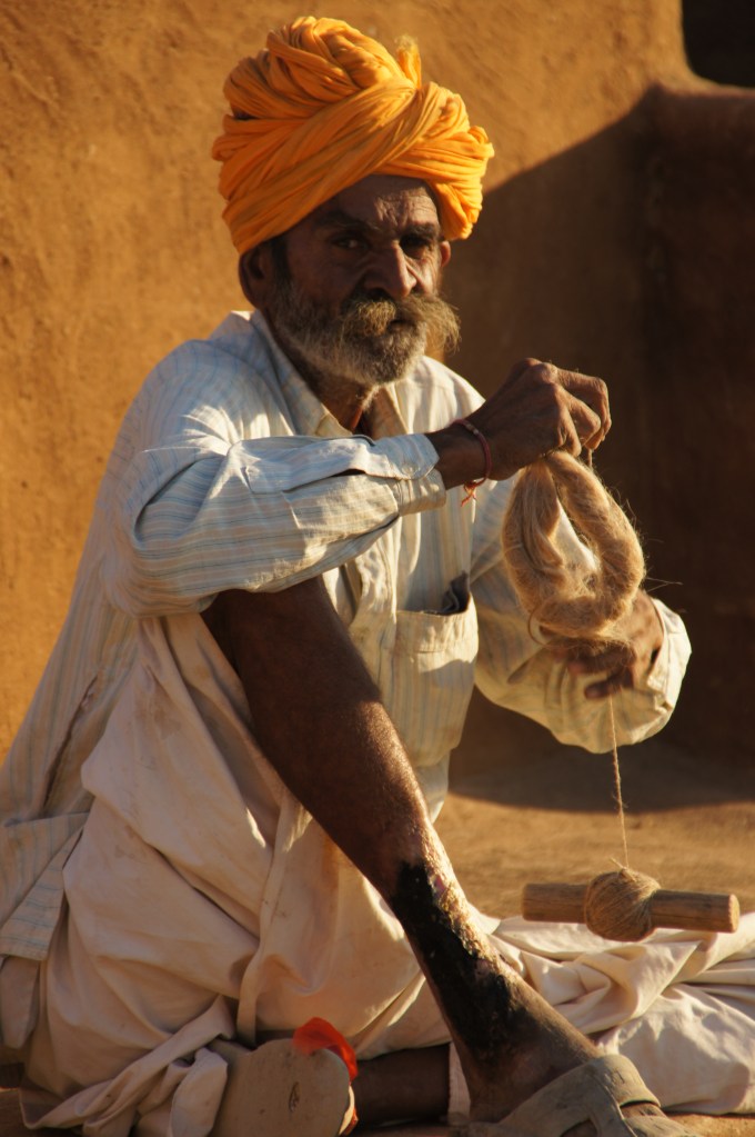 Mann mit Spindel in Kurhi